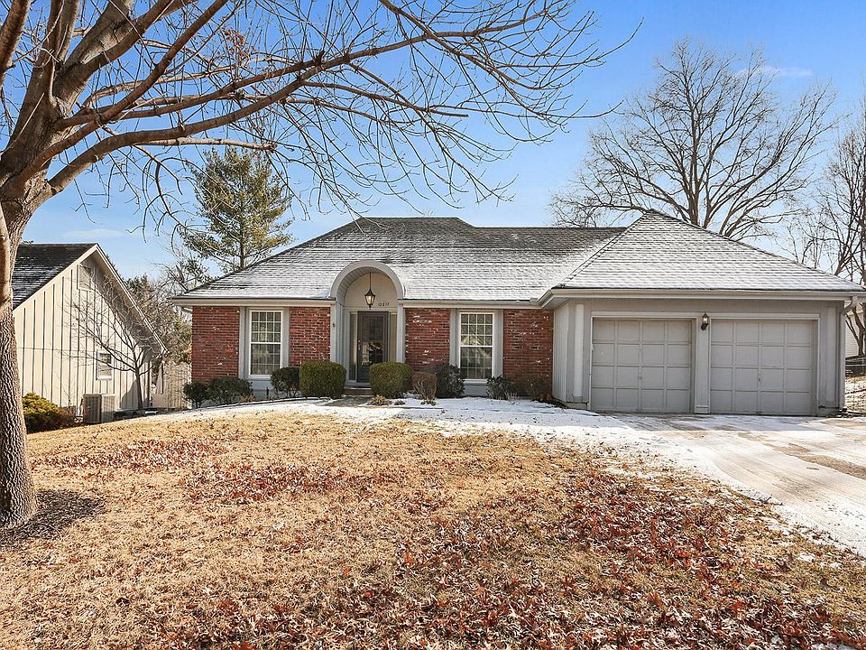 Front of home w/ oversized 2-car garage. It's not snowing in July, New photos coming soon.