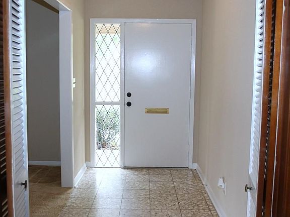 Light & bright Entry w/Formal Living Room to the right of Entry.