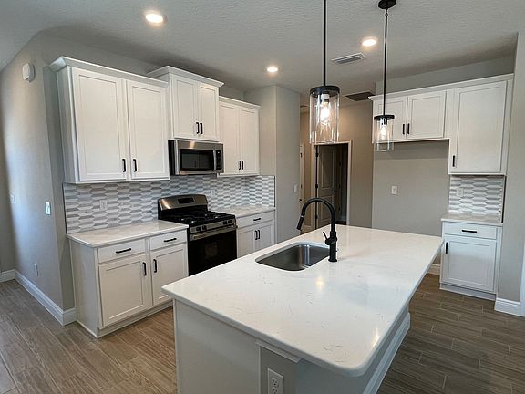 Sandpiper new construction quick move-in home plan at Fairway Pointe in Ruskin, FL by William Ryan H
