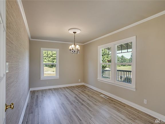 French doors lead to formal dining room; may also be used as office or other dedicated space