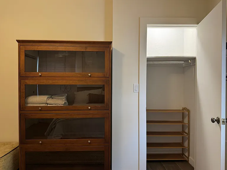 - Tall Dresser in Bedroom
- 1 of 2 Closets in Bedroom