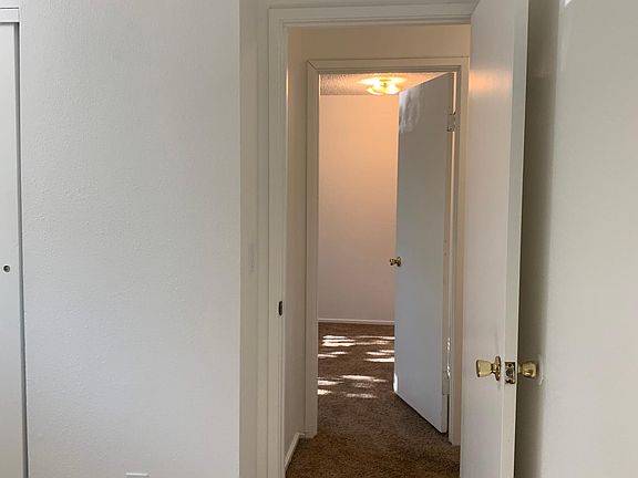 Looking from one bedroom to another