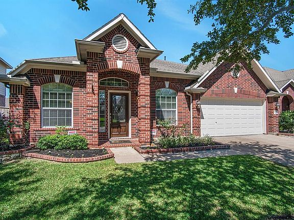 2 car garage and double wide driveway provide plenty of parking