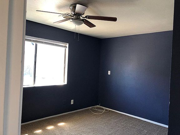 Modern ceiling fan in master bedroom