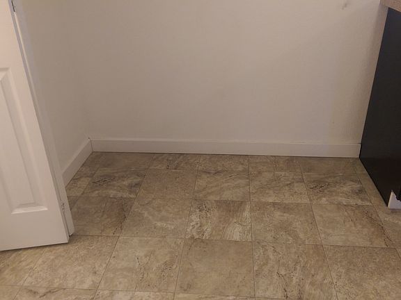 Kitchen has room for a full size freezer or a very large din