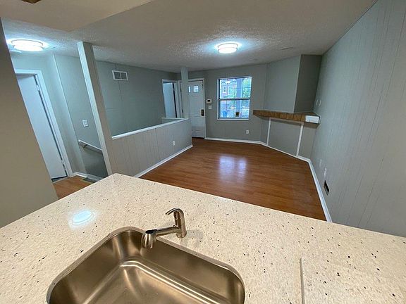 Open living area with kitchen bar