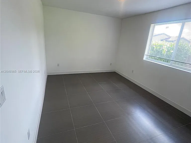 545 NW 121st St — Photo 10