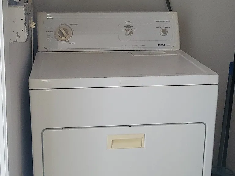 Utility room with dryer