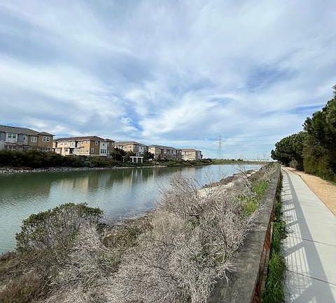 jogging path with water way behind the property