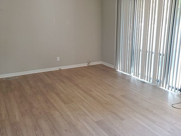 Living room has vaulted ceilings.