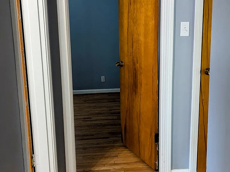 The bedrooms are across the hall from each other and separated by the main bathroom