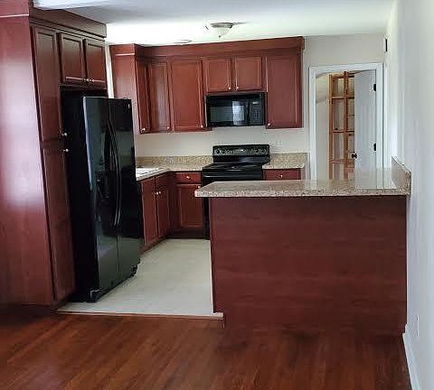 Kitchen Looking From Family Room w/Breakfast Bar Area (2 Stools)