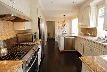 The Kitchen is Accented with Granite Counter and Stainless Appliances 