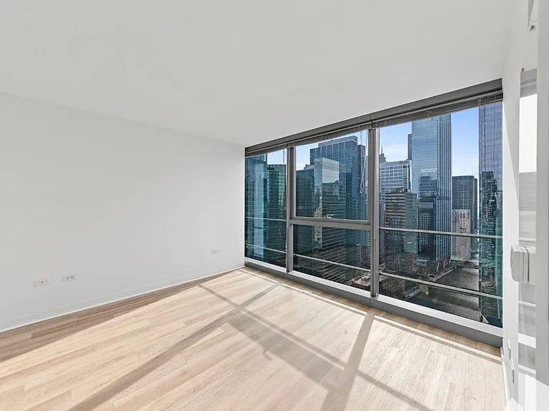 325 W Wolf Point Plz #2703 — Photo 1