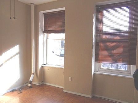 5th image of 231 E 10th St APT 3
