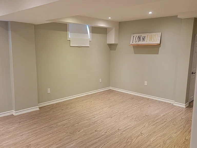 593 Ray Lawson Blvd #BASEMENT — Photo 9