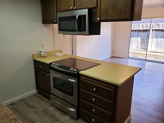 Kitchen - Dining - to side and back yard.