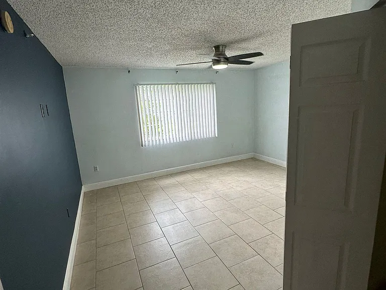 5005 Wiles Rd — Photo 30