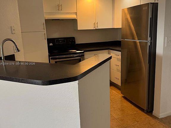 2nd image of 3400 Pinewalk Dr N APT 924