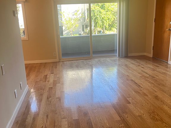 MAIN ROOM W/ SLIDING DOOR LEADING TO PATIO