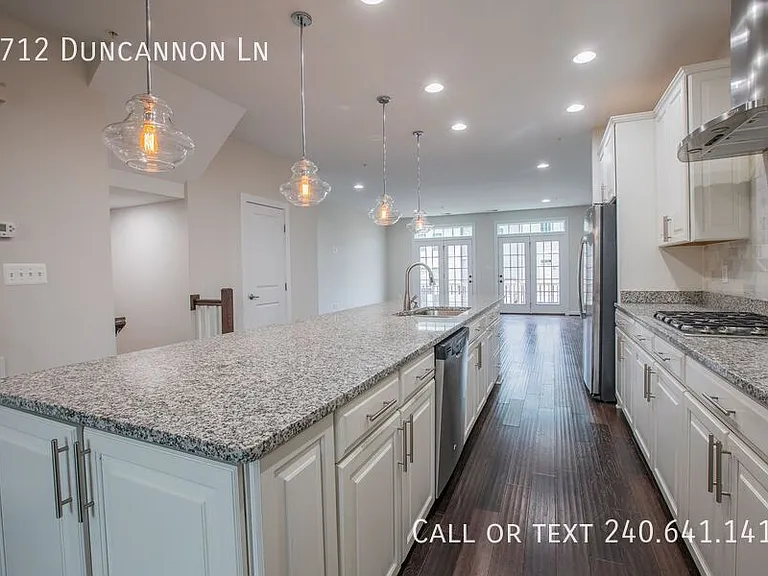 7712 Duncannon Ln — Photo 10