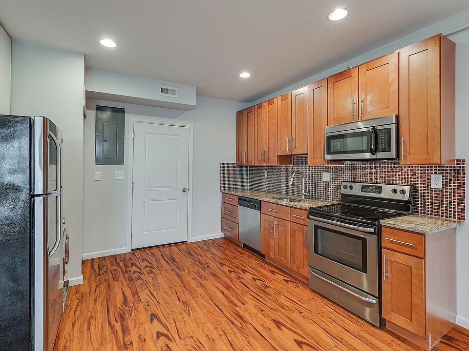 Model Unit Photo - Units are virtually identical just flipped - ie. kitchen is on the right-hand side and bedrooms are on the left-hand side when walking into Unit 401.