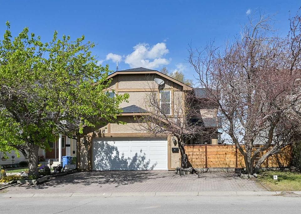 1st image of 44 Coach Manor Rise SW