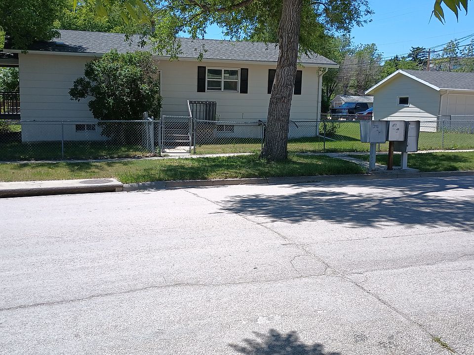 Front of House and two car detached garage view