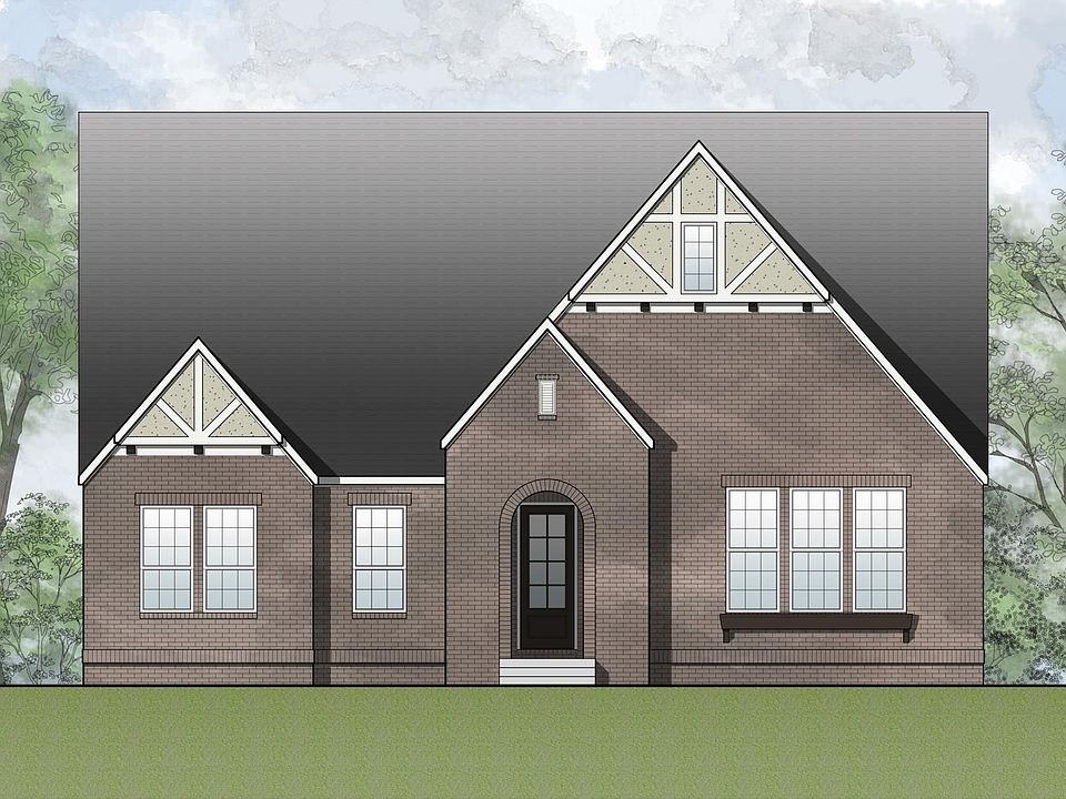 new home with brick and stucco