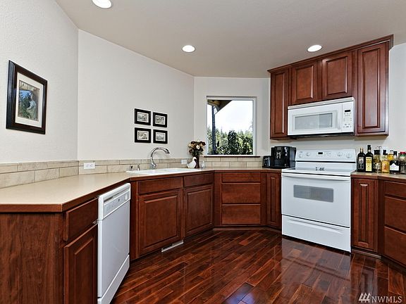 Very efficient kitchen. And check out the teak floor that are throughout. Stunning!