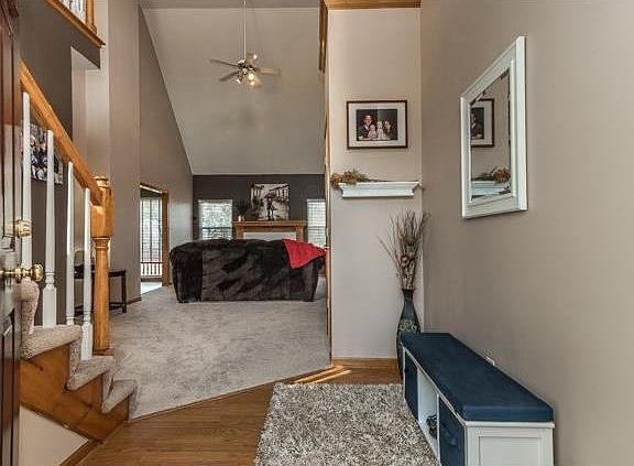 Enjoy a vaulted ceiling and newer carpet installed 09/2016 from the entry!