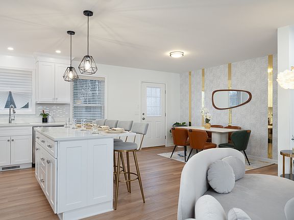 Overview of Kitchen Island, Dining Area and Livingroom