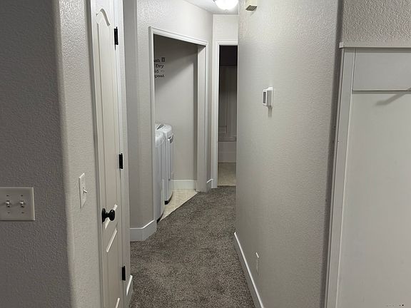 Hallway shot. Master bedroom to the left and the other two rooms to the right