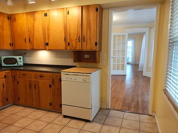 Convenient Dishwasher- Looking Into Formal Dining Room Then Livingroom.
