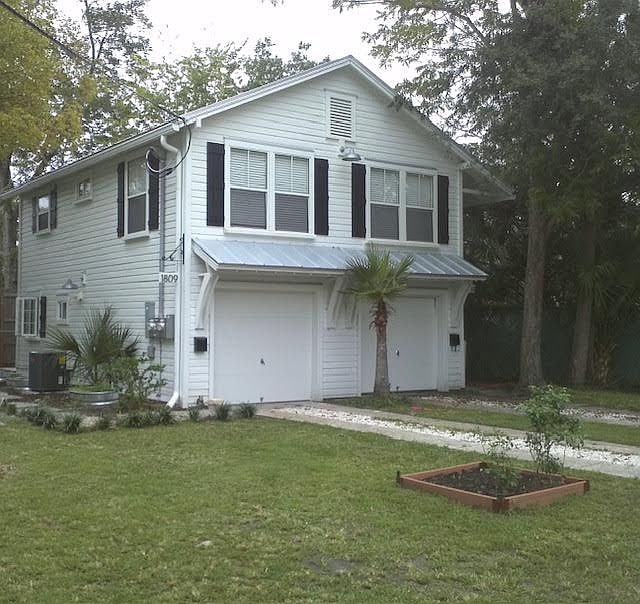 Front of Garage with this Private Garage on LEFT with walkway on LEFT to rear
