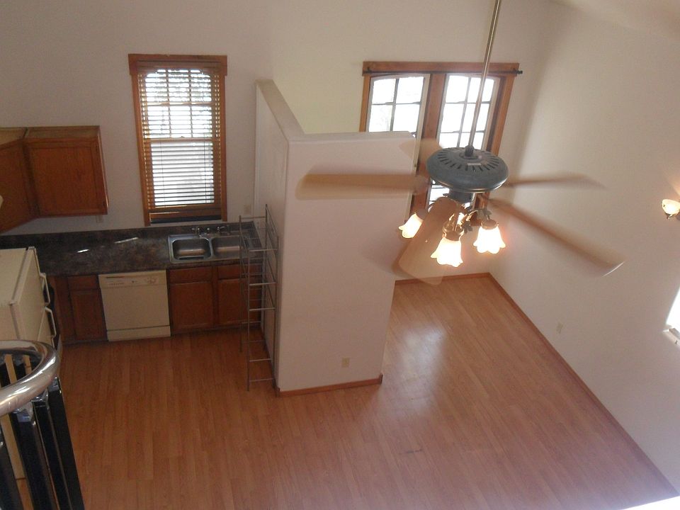 Birdseye view from the loft of the kitchen, laundry, and living room.