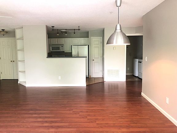 Spacious, Open Floor Plan features Kitchen Opening to Dining