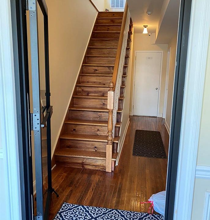 first floor hallway and staircase to second and third floors