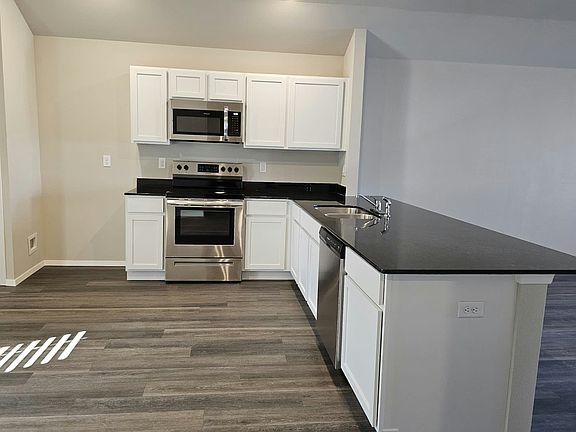 KITCHEN ISLAND, STOVE AND MICROWAVE