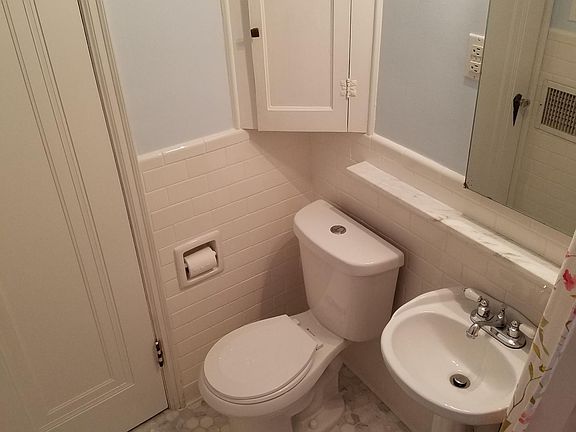 New tile, new marble floor, new toilet, new sink