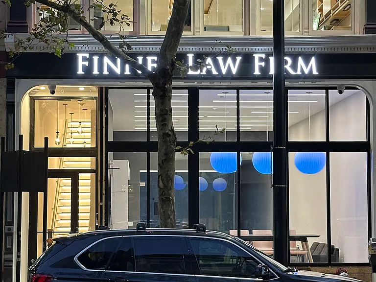 Suites are on 3rd/4th floors above law firm
