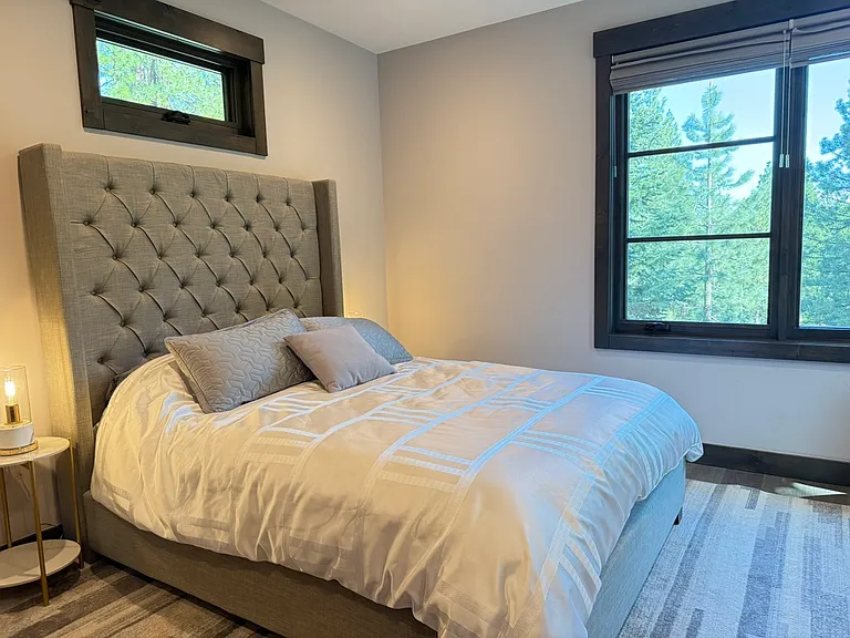 Second Master suite on the main floor, Queen bed, walk in closet and en-suite bathroom