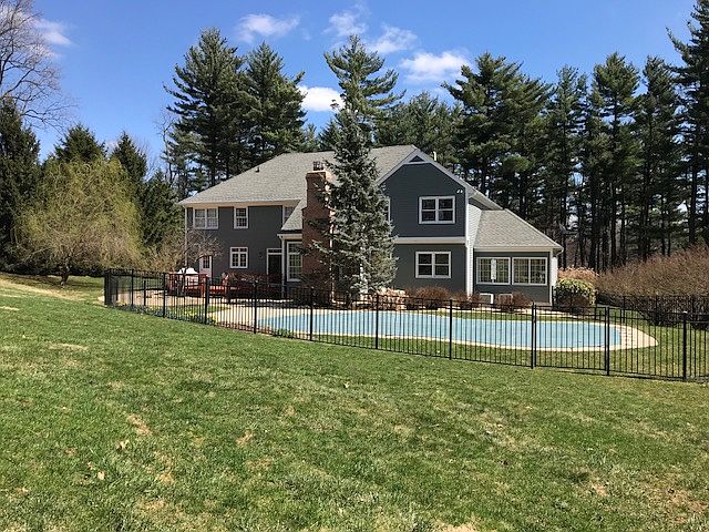 View of rear of home & pool.