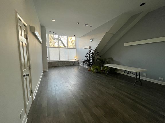Spacious living room with 12' ceilings