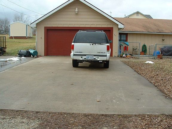 View of garage and driveway