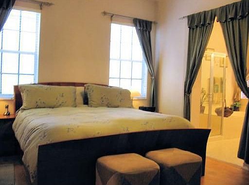 Master bedroom has huge walk-in closet and separate bathroom suite