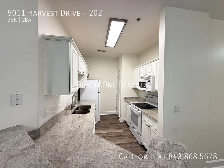 5011 Harvest Dr #202 — Photo 3