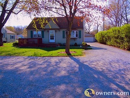 View from front of the house. Driveway has a turnaround.