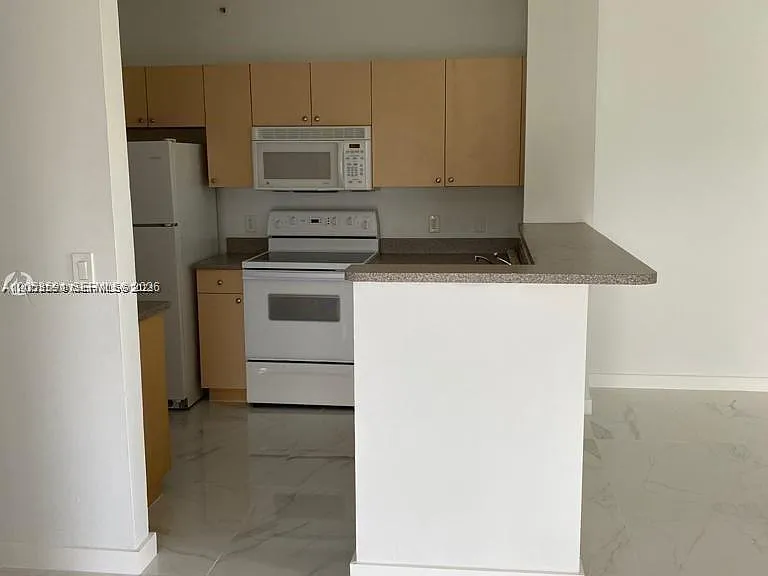 7980 N Nob Hill Rd #102 — Photo 4