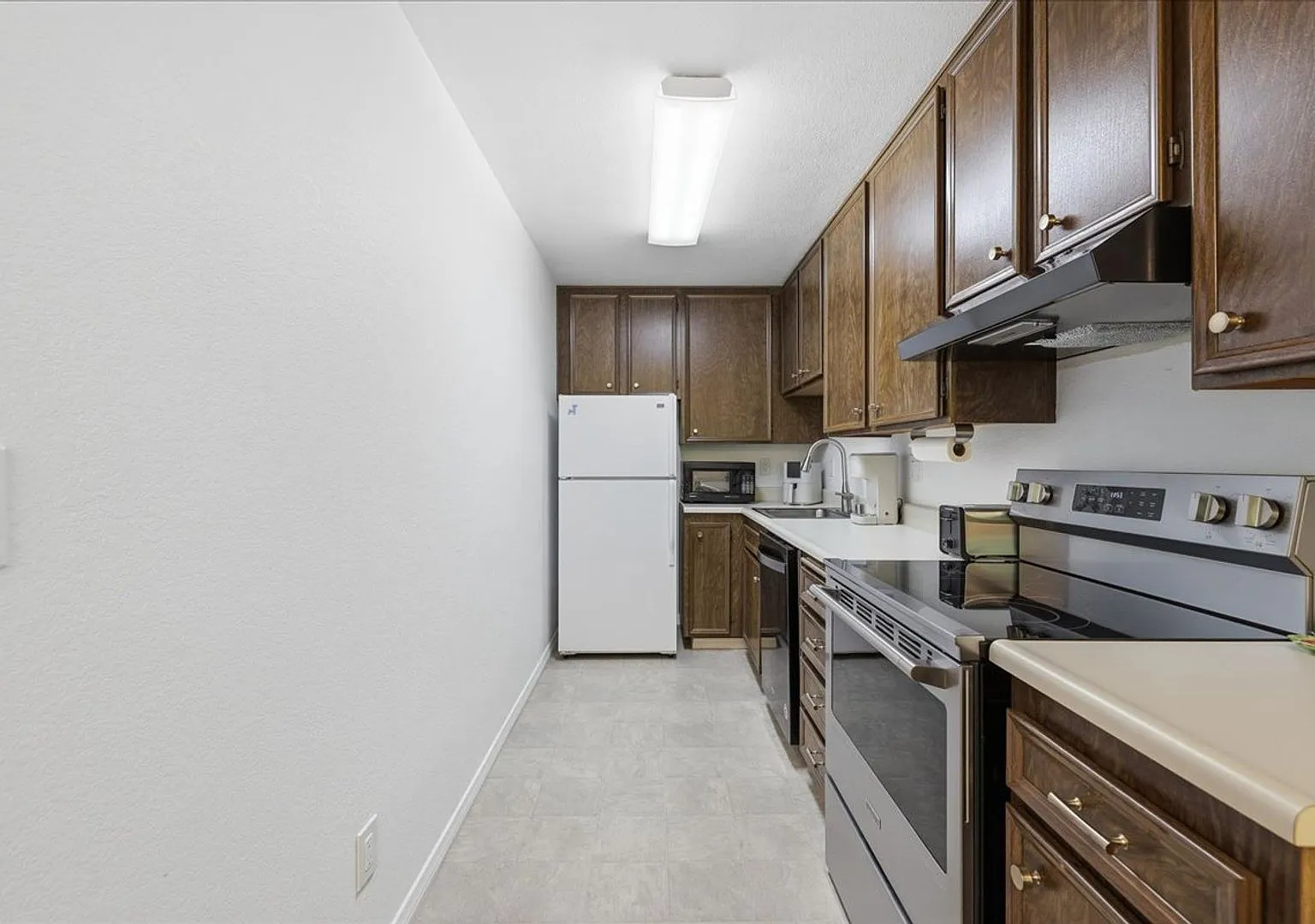 2nd Floor, Corner Unit Condo at Palm Springs Villas II — Photo 1